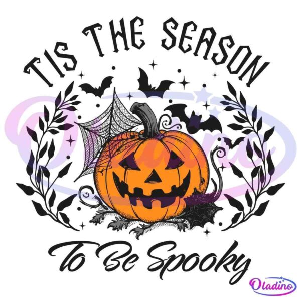 A Halloween-themed image featuring a grinning, carved pumpkin illuminated from within. Surrounding it are cobwebs, a spider, and flying bats. The text above reads "Tis the Season" and below "To Be Spooky".